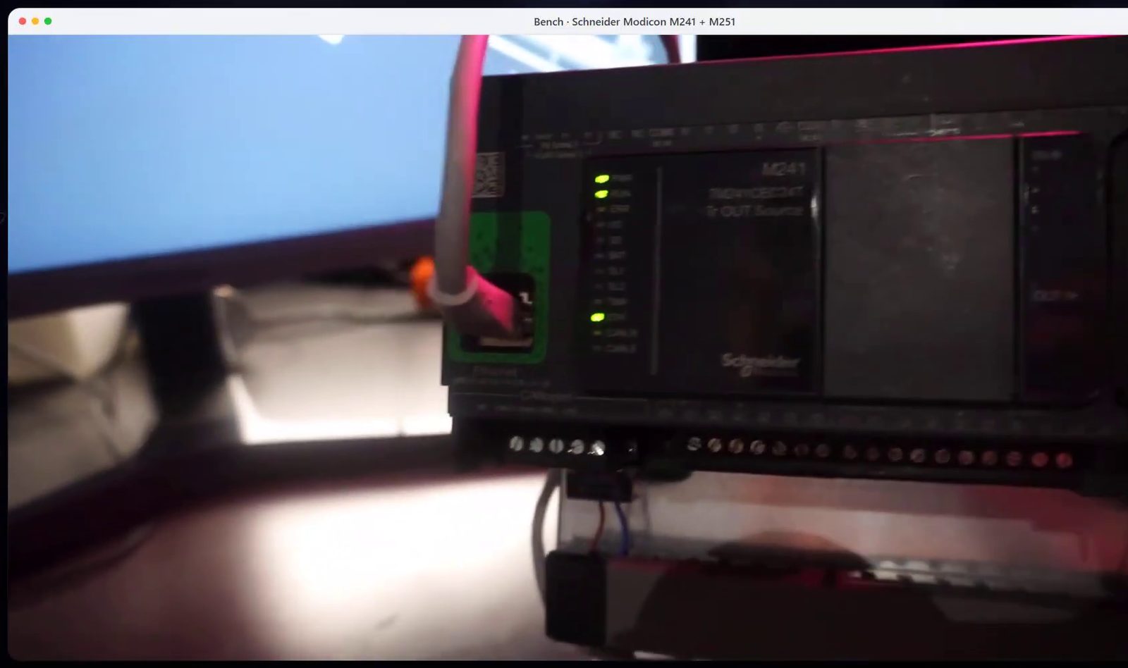 A real Schneider Modicon M241 on the bench, exchanging I/O with the StateTick Runtime