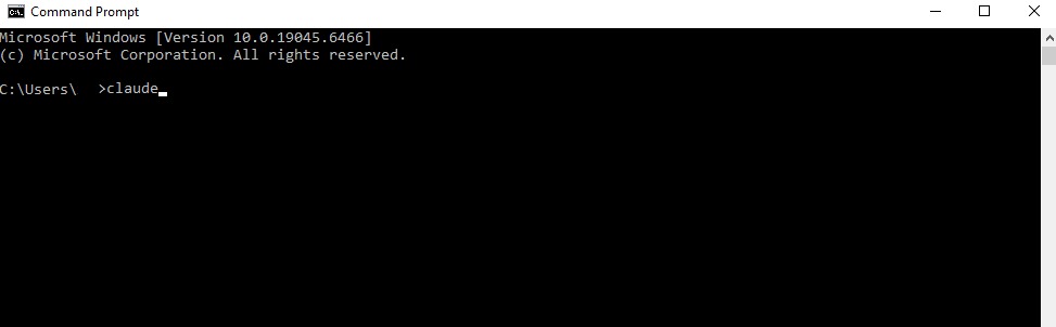 A fresh Windows Command Prompt window with the command claude typed at the prompt